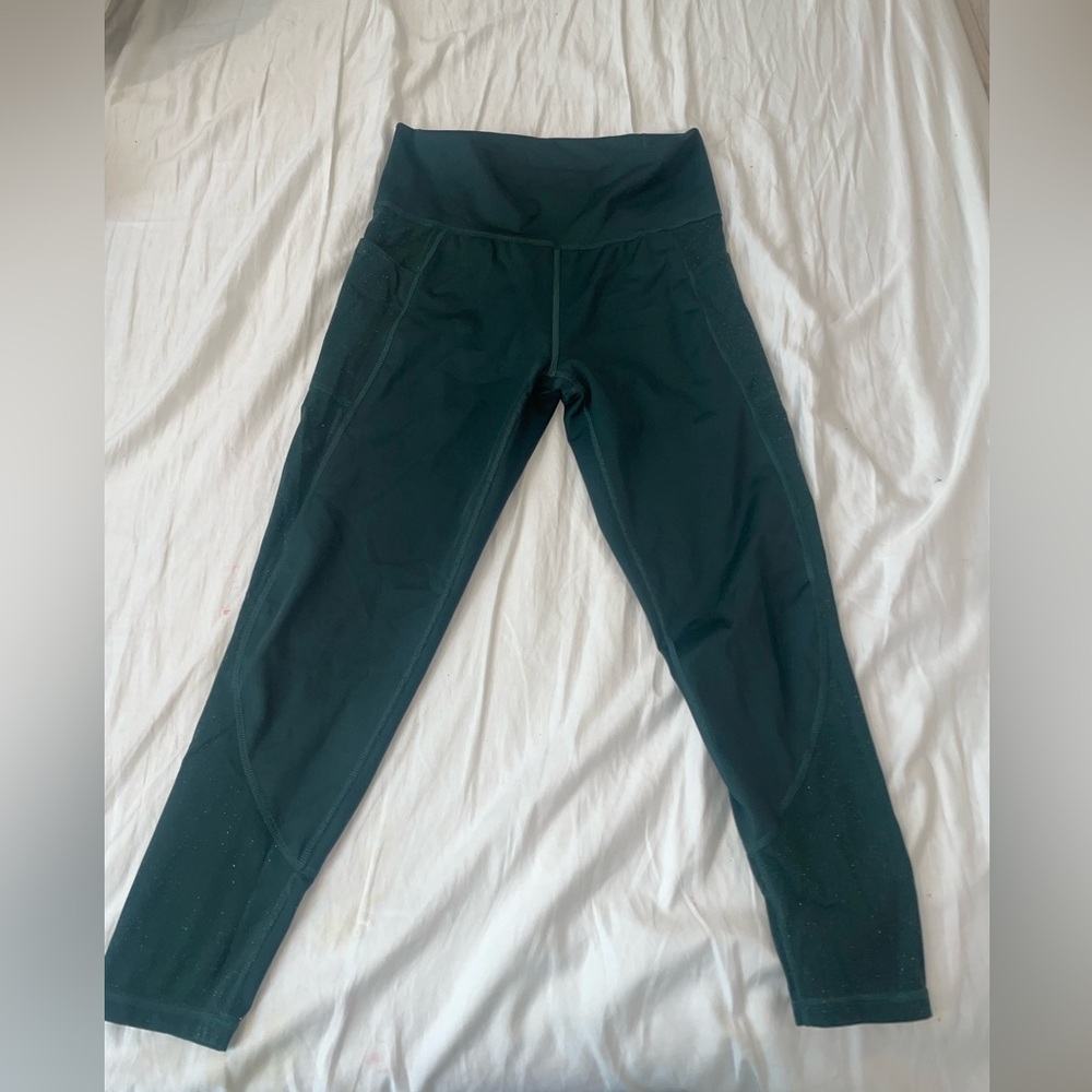Adidas yoga pants . Never worn . Very pretty with a little sparkle.